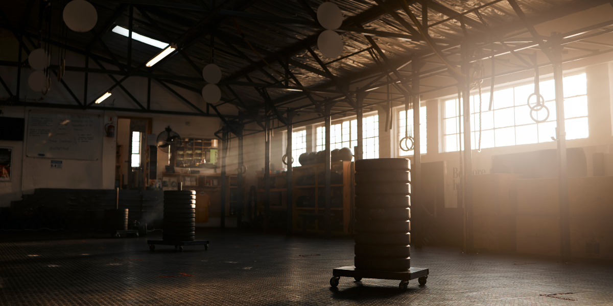 An empty gym equipped with a weight sled