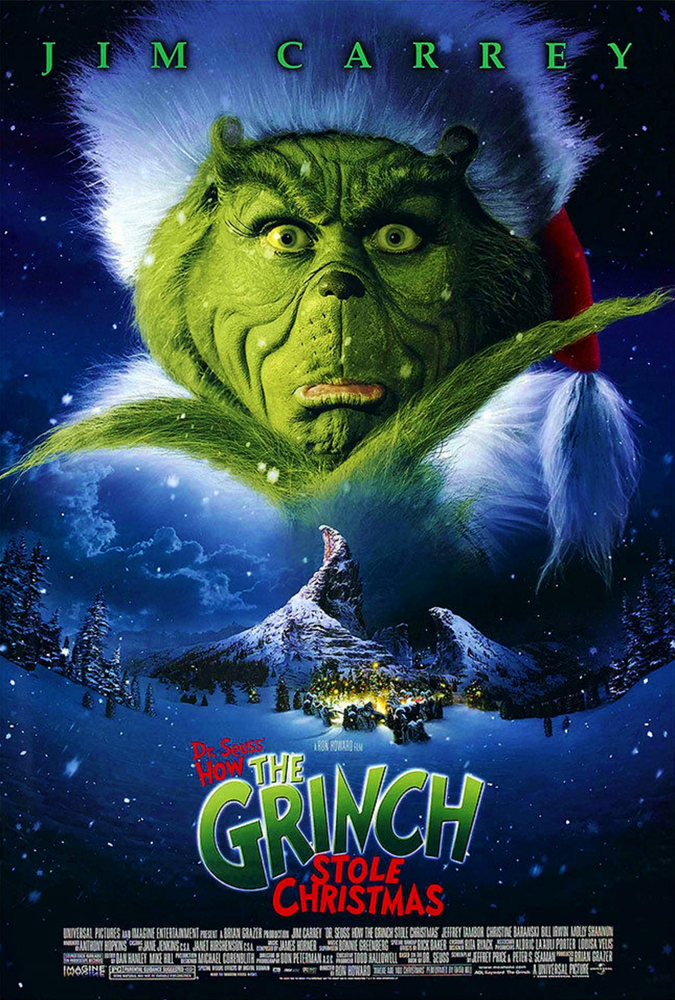 jim carrey as the green hairy grinch makes a silly face on the cover of how the grinch stole christmas