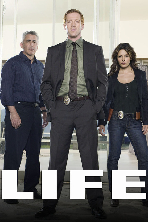 the cover of LIFE shows three cop looking people on it