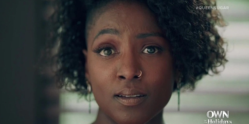 A close up shot of Nova Bordelon (played by Rutina Wesley), her eyes brimming with tears.