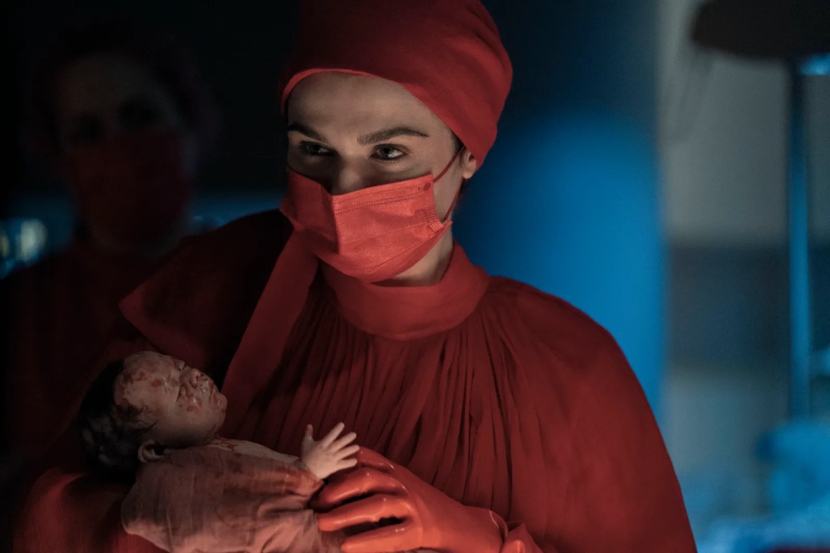 Rachel Weisz holds a bloody baby who has just been born
