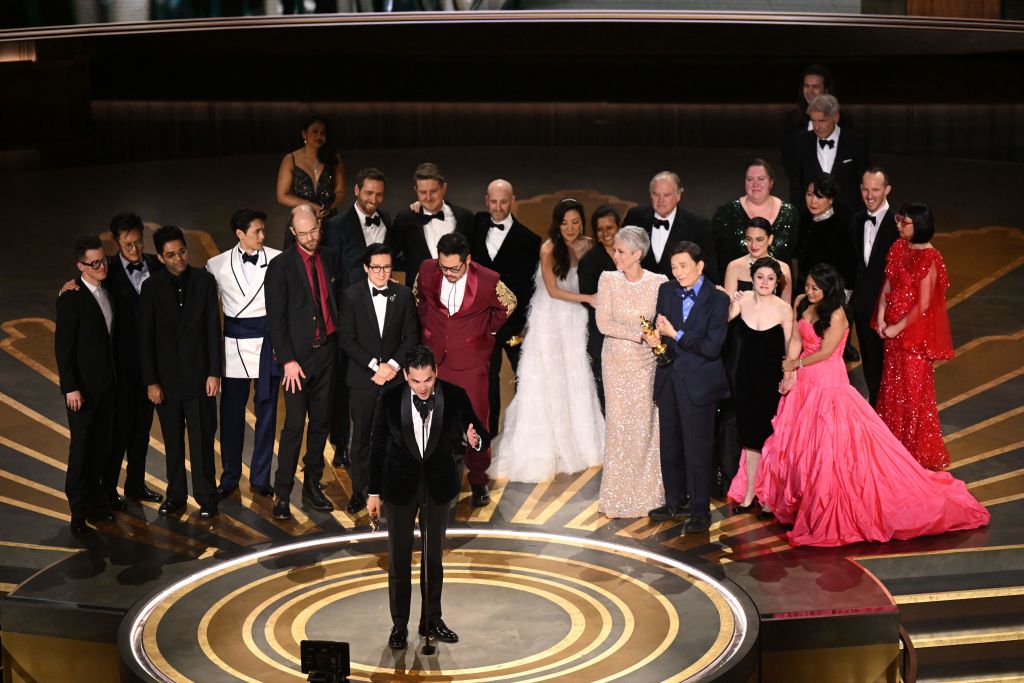 US film producer Jonathan Wang (C) accepts the Oscar for Best Picture for "Everything Everywhere All at Once" onstage during the 95th Annual Academy Awards at the Dolby Theatre in Hollywood, California on March 12, 2023. (Photo by Patrick T. Fallon / AFP) (Photo by PATRICK T. FALLON/AFP via Getty Images)