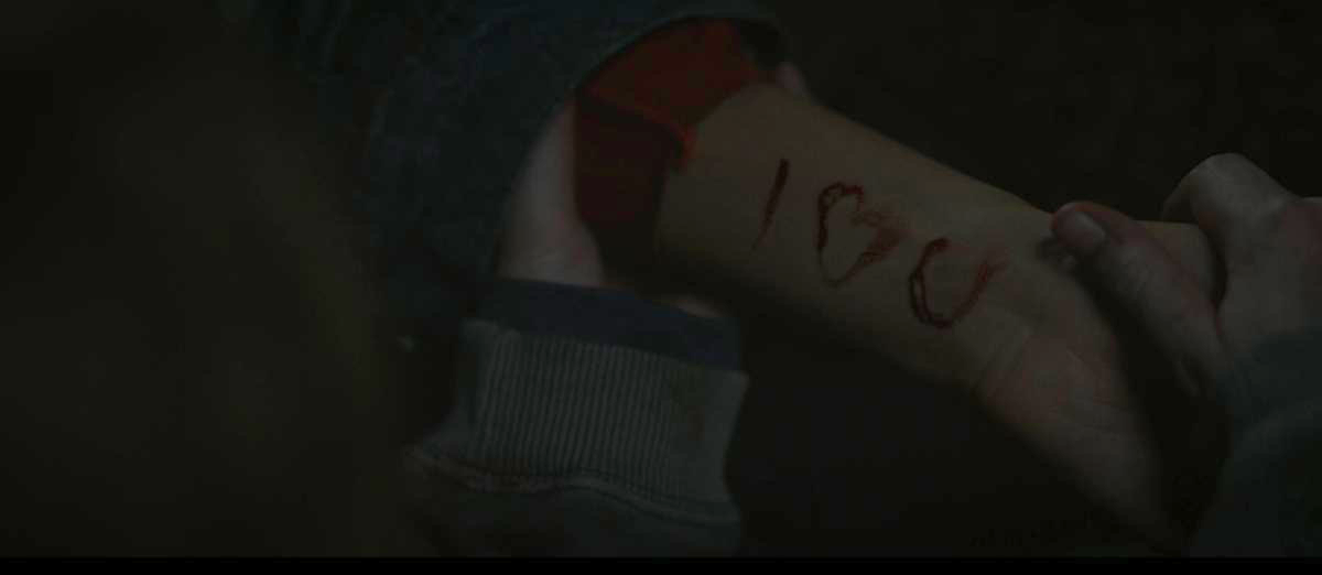 I <3 U on an arm written in blood in Yellowjackets 201