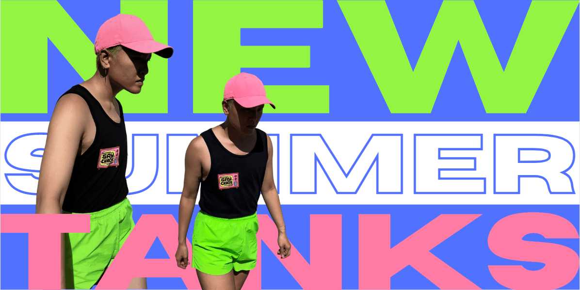 Viv is in an ad for the new Gay Chaos Autostraddle tank tops, a pink baseball cap covers their face