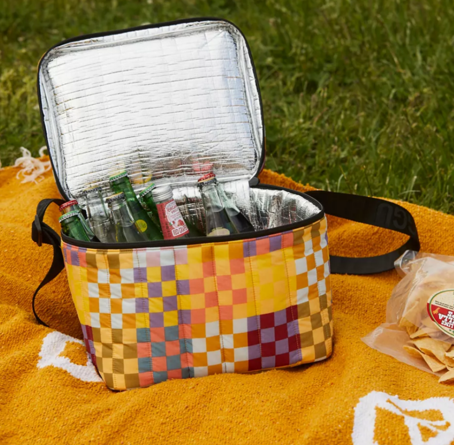 a cooler bag with orange and yellow squares on it