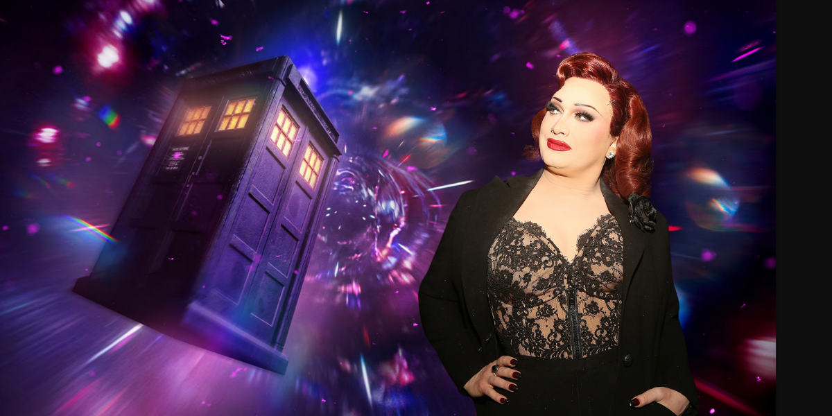 Jinkx Monsoon standing in space near the TARDIS