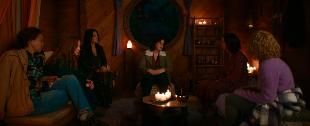 The adult Yellowjackets convene in the sharing shack.