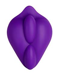 The b.cush is a vulva-shaped piece of purple silicone with two oblong bumps in the center.