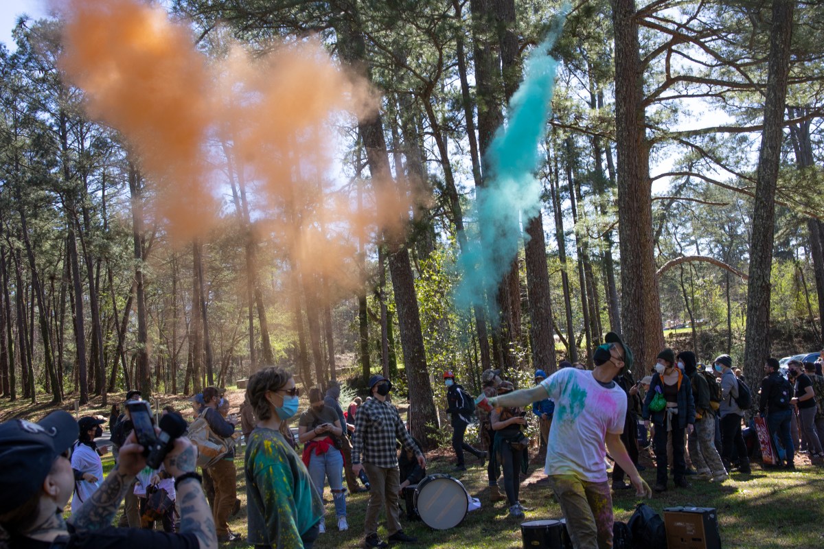 ATLANTA, GEORGIA - MARCH 4: Environmental activists hold a rally and a march through the Atlanta Forest, a preserved forest Atlanta that is scheduled to be developed as a police training center.