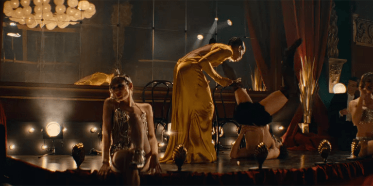 Three actors perform on stage at El Dorado