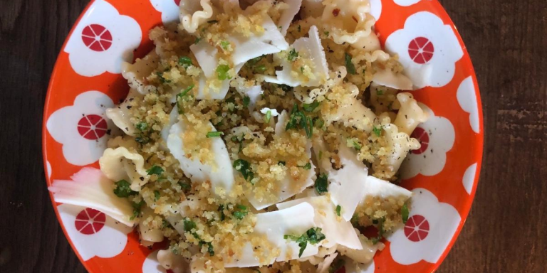 a bowl of clam pasta