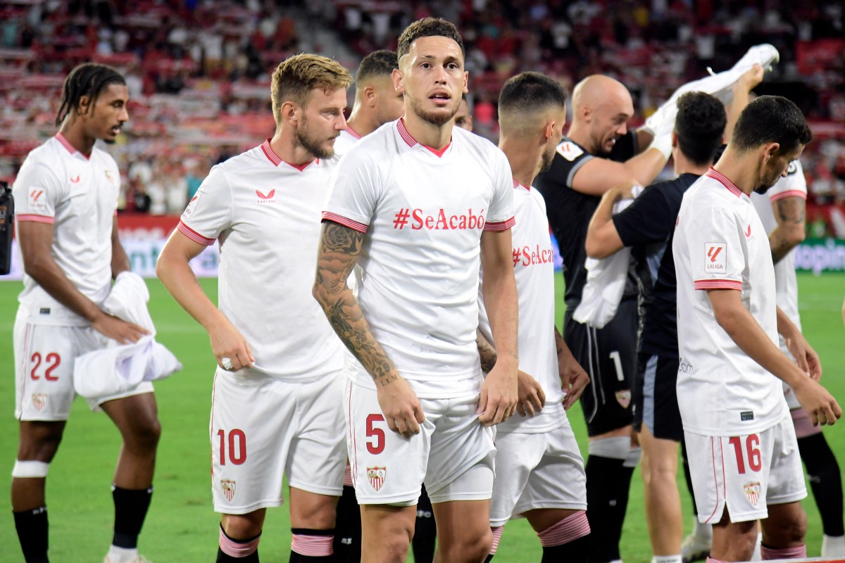 Sevilla wear jerseys that say 'It's over' // Photo by CRISTINA QUICLER/AFP via Getty Images