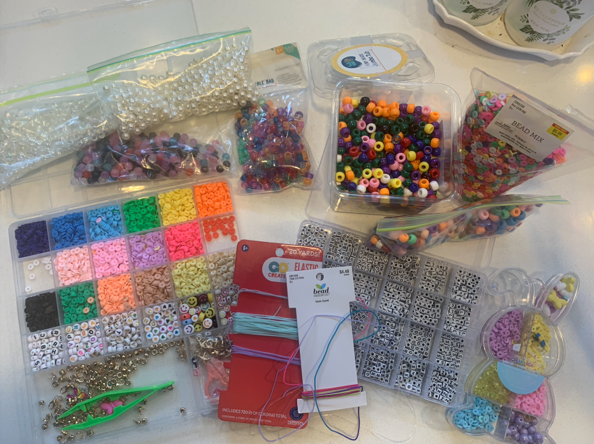 a selection of colorful beads and letter beads