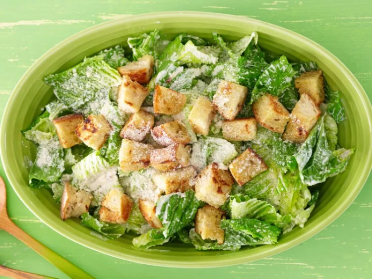 a plate of caesar salad