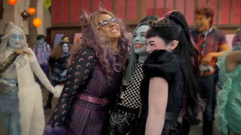 Monster High 2: Clawdeen, Frankie, and Draculaura smile and hug