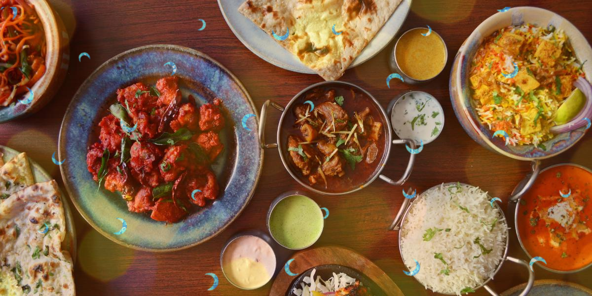 A table set with Indian food