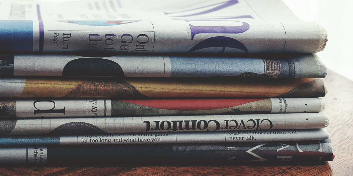 a stack of newspapers