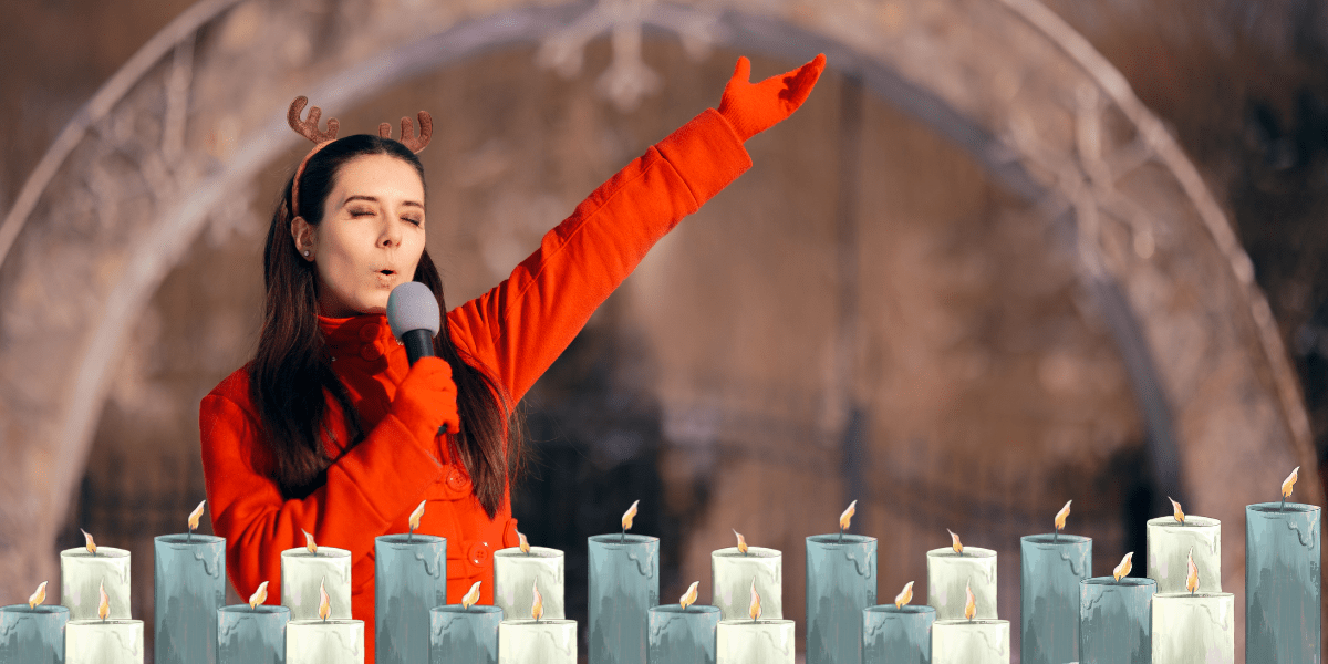 a young woman singing a christmas song dressed as a reindeer