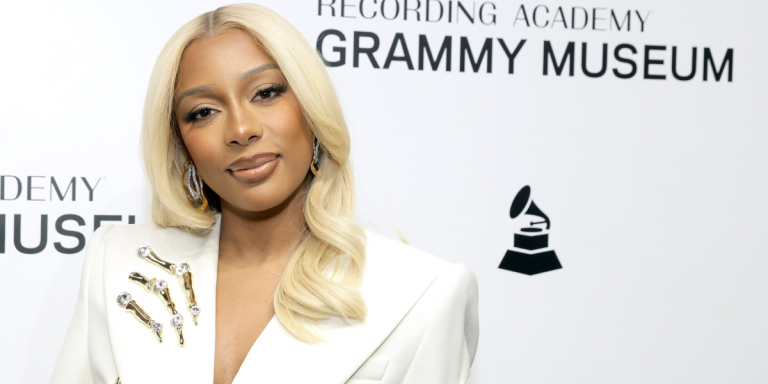 Victoria Monet at the Grammy Museum in a white jacket