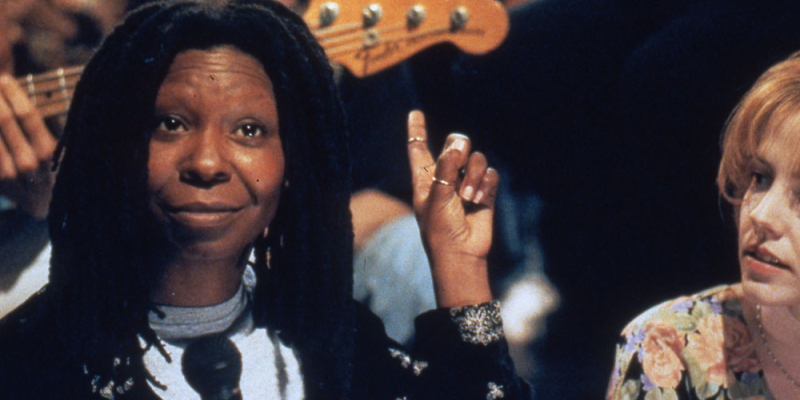 Whoopi Goldberg points and smiles in Boys on the Side