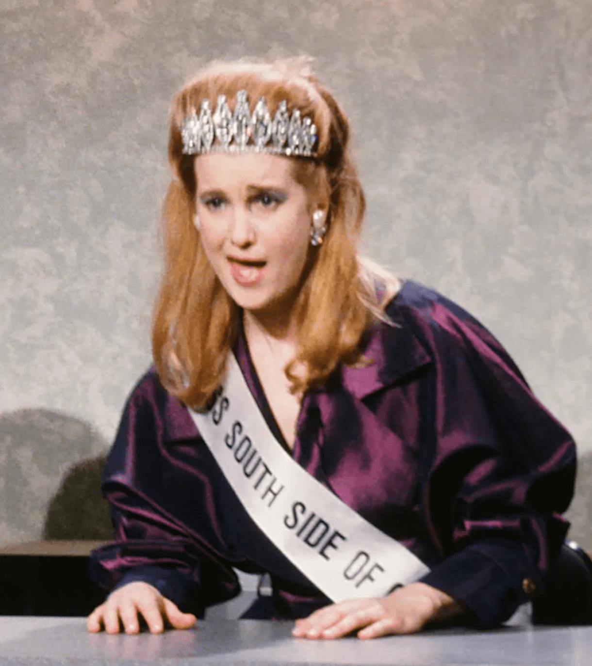 Beth Cahill performing a sketch in a tiara on Saturday Night Live