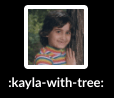 an image of kayla as a child in a rainbow shirt leaning on a tree