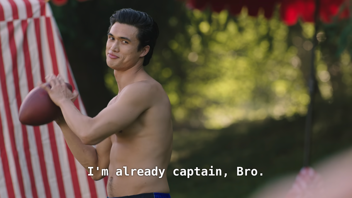 Charles Melton throws a football. CC: I'm already captain, Bro.