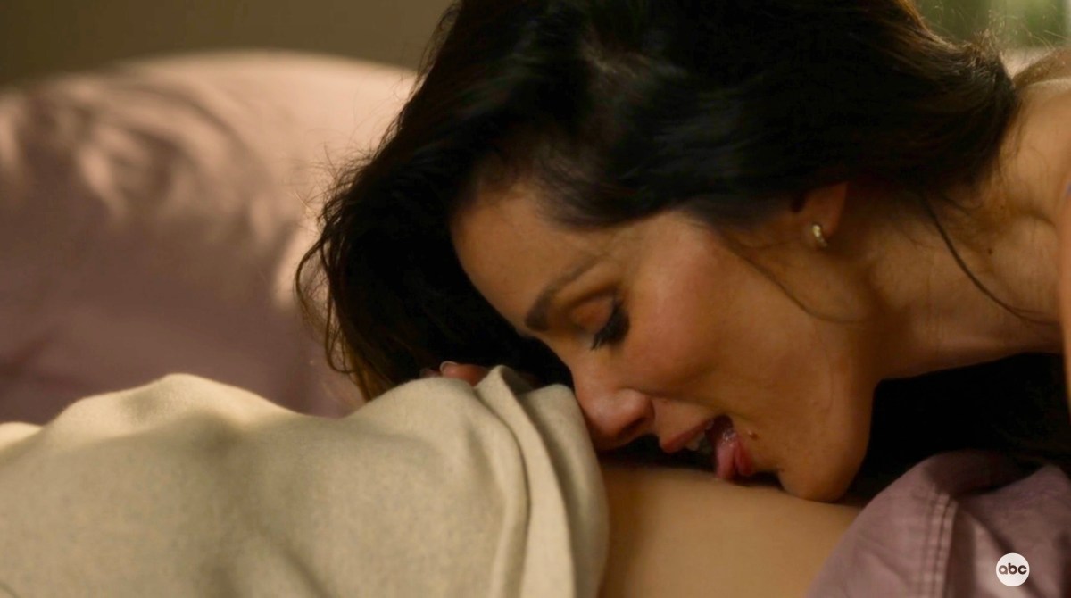 Carina licks Maya's navel on Station 19