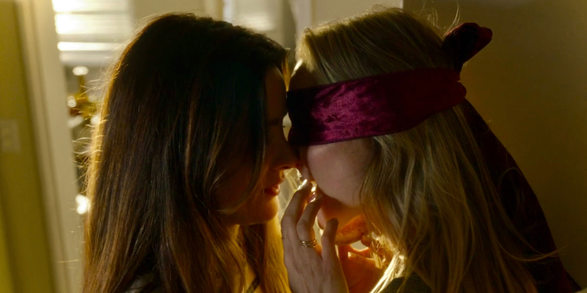 Station 19 707: Maya and Carina kiss wearing blindfolds.