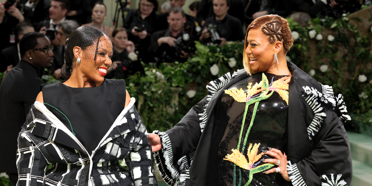 Queen Latifah and her partner Eboni Nichols walk the Met red carpet