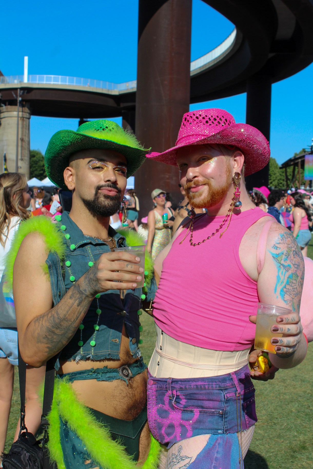 Two queers in cowboy hats at the Chappell Roan show at Kentuckiana Pride