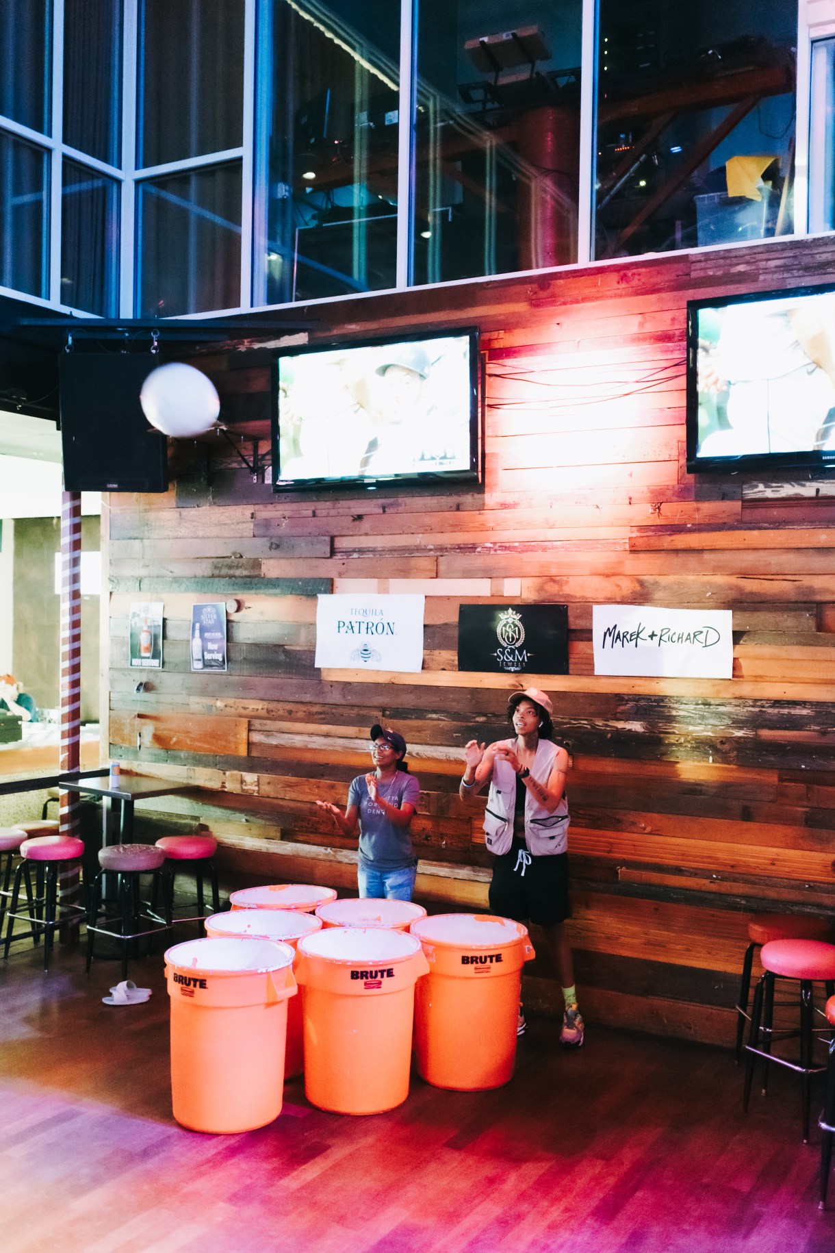 Patrons of Sue Ellen’s competing in the beer pong tournament 
