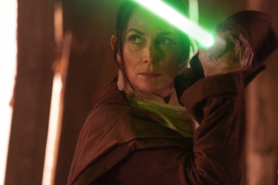 Jedi Master Indara (Carrie-Anne Moss) in Lucasfilm's THE ACOLYTE, exclusively on Disney+. ©2024 Lucasfilm Ltd. & TM. All Rights Reserved.