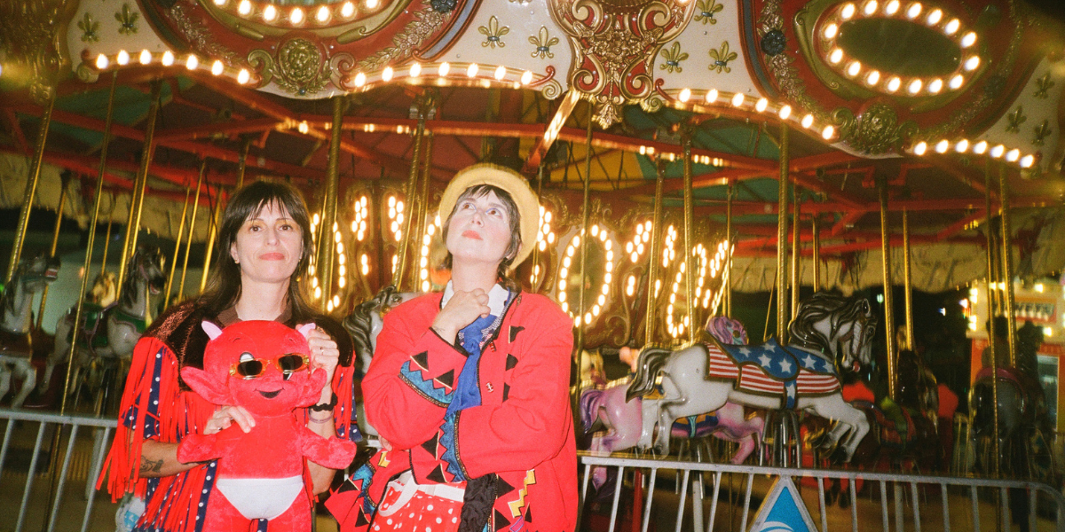 Las Nubes next to a carousel