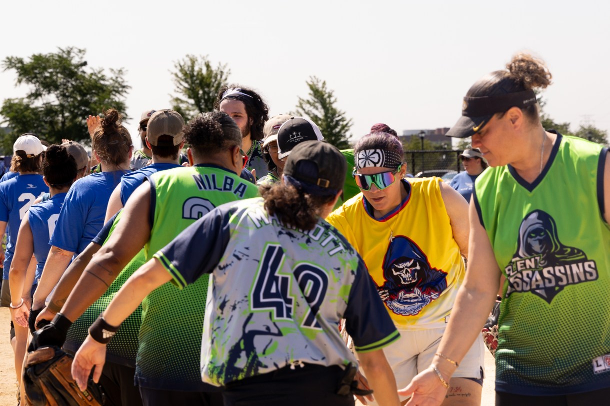 a time high fives before a softball game