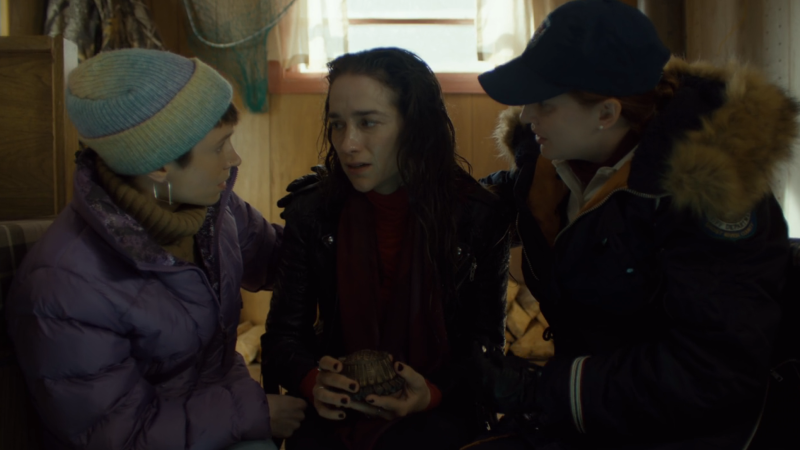 wynonna earp vengeance: waverly and nicole sit with a wet, fresh-outta-hell Wynonna