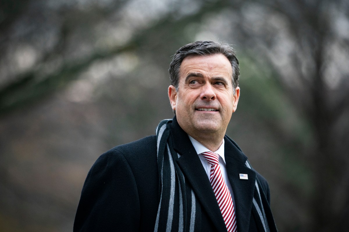 WASHINGTON, DC - DECEMBER 12: Director of National Intelligence John Ratcliffe follows behind U.S. President Donald Trump, as they depart on the South Lawn of the White House, on December 12, 2020 in Washington, DC. Trump is traveling to the Army versus Navy Football Game at the United States Military Academy in West Point, NY. (Photo by Al Drago/Getty Images)