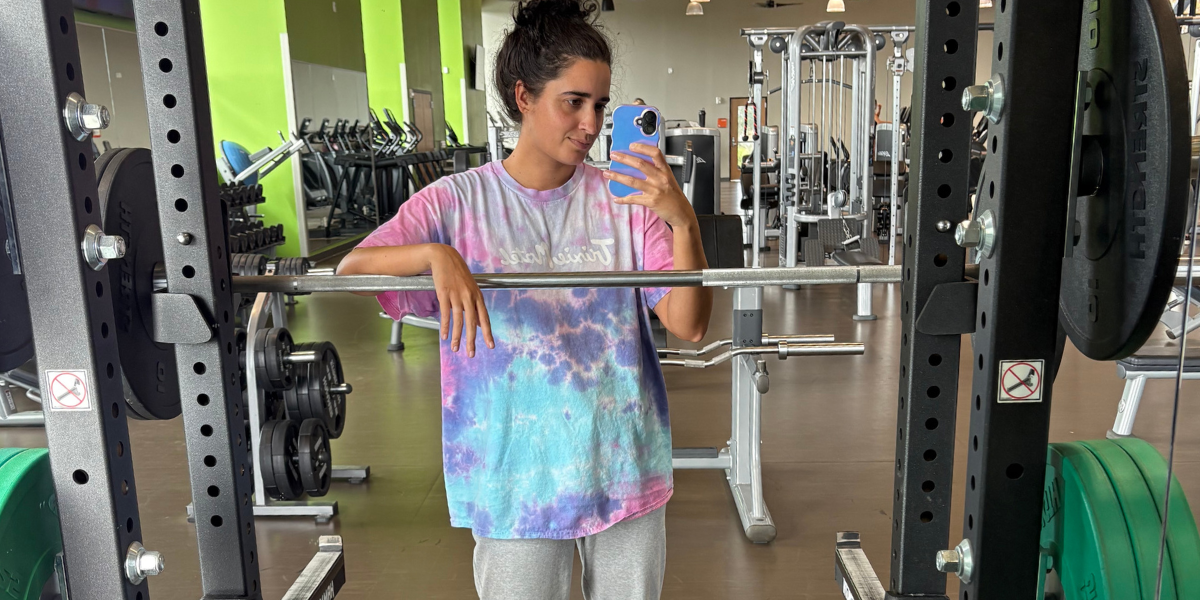 kayla kumari upadhyaya wearing gray sweatpants and a tie-dye t-shirt