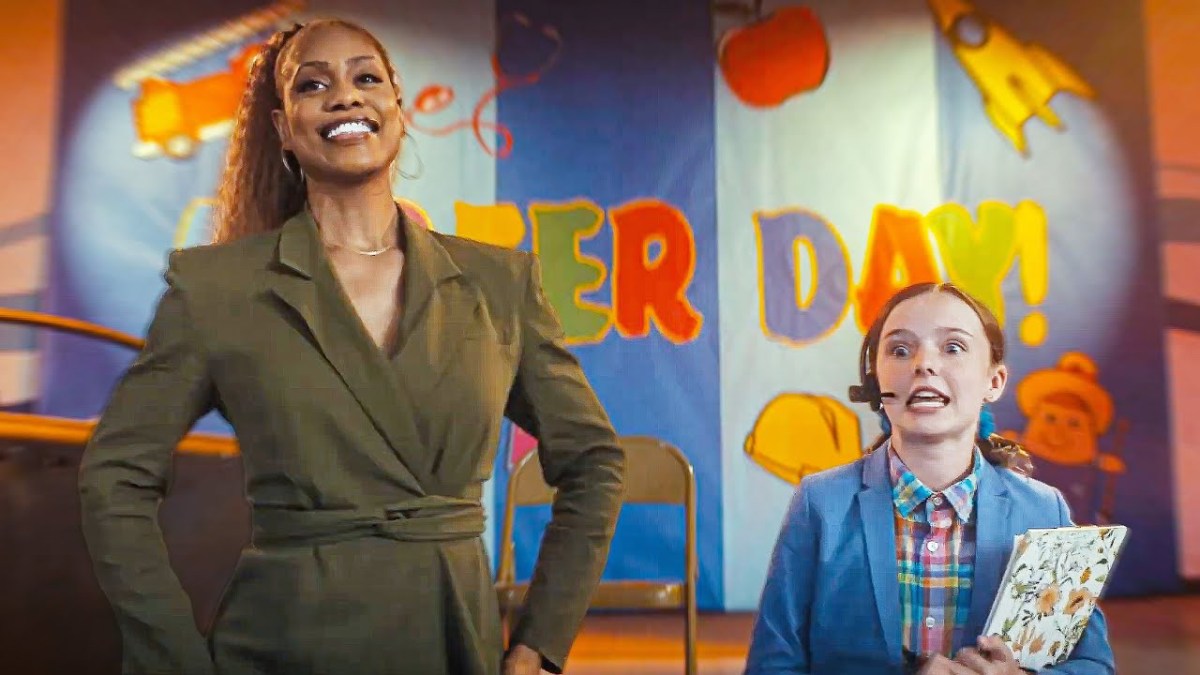 laverne cox standing with a small white girl in a blazer in "clean slate"