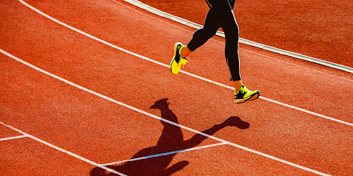 legs running on a track