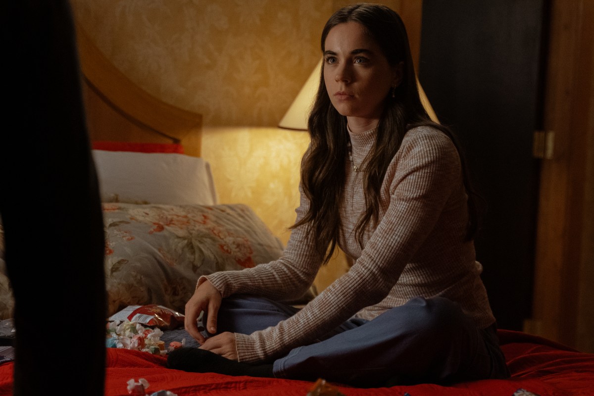 Callie on the motel bed