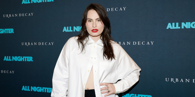Kathryn Gallagher in a white buttoned top poses at the All Nigher opening night