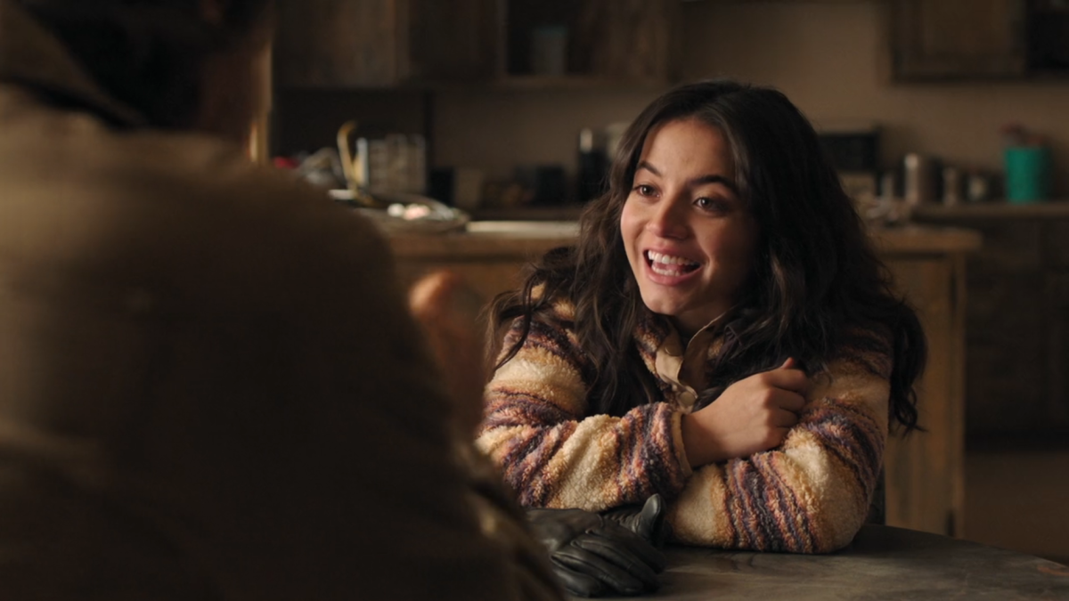 The Last of Us: Isabela Merced as Dina beaming at Joel