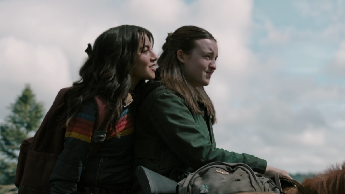 The Last of Us 203-9 ellie and dina on horseback with dina flirting in ellie's ear