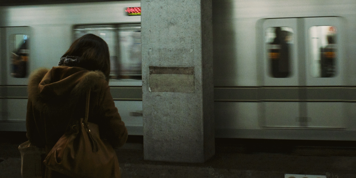 person waiting for subway