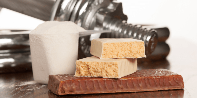 A Queer Powerlifter’s Guide to the Perfect Protein Bar