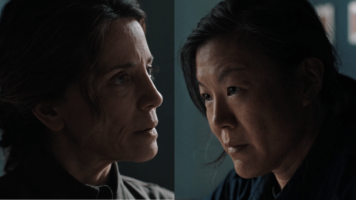 The Last of Us 205: Hanrahan and Park sit across the table from one another