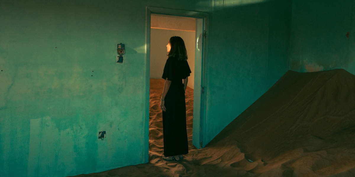 a person looking out into a desert