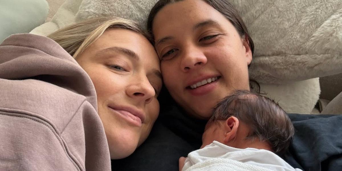 Kristie Mewis and Sam Kerr with their new baby boy