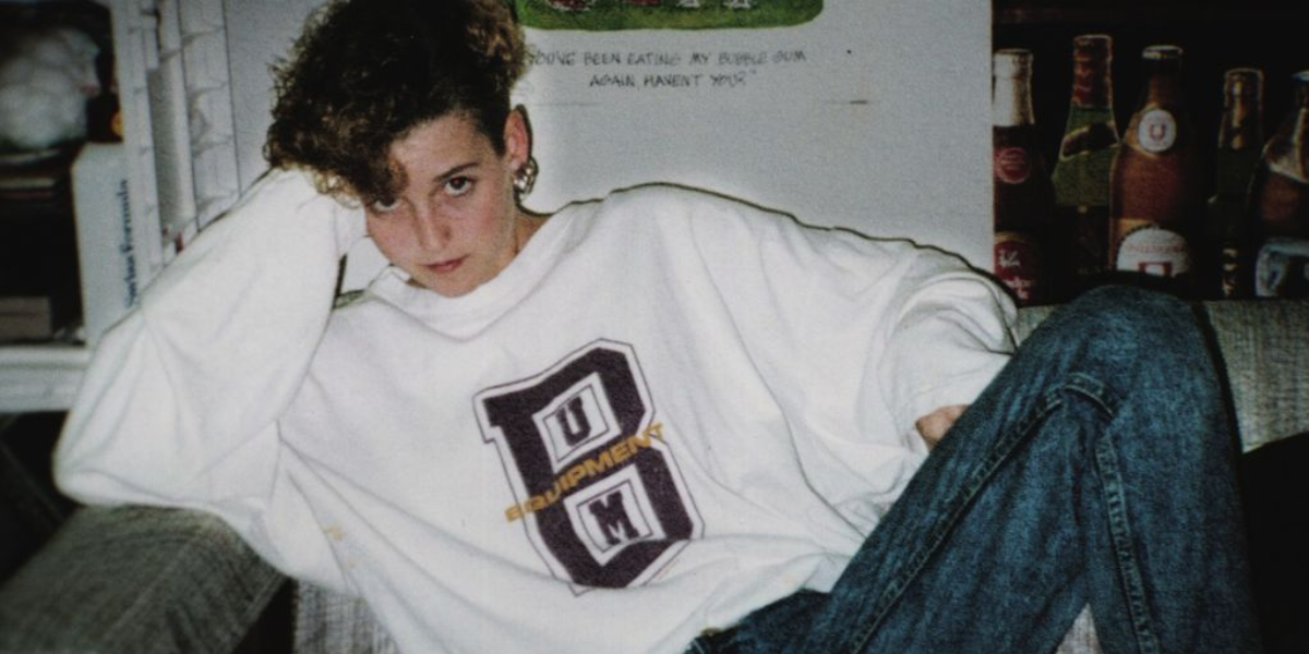 Amy Bradley posing in a sweatshirt